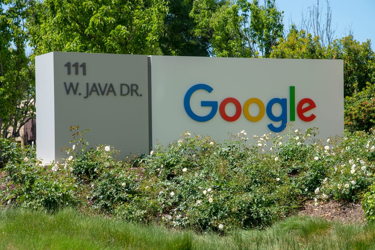 Photo of Google logo on a sign at company HQ.